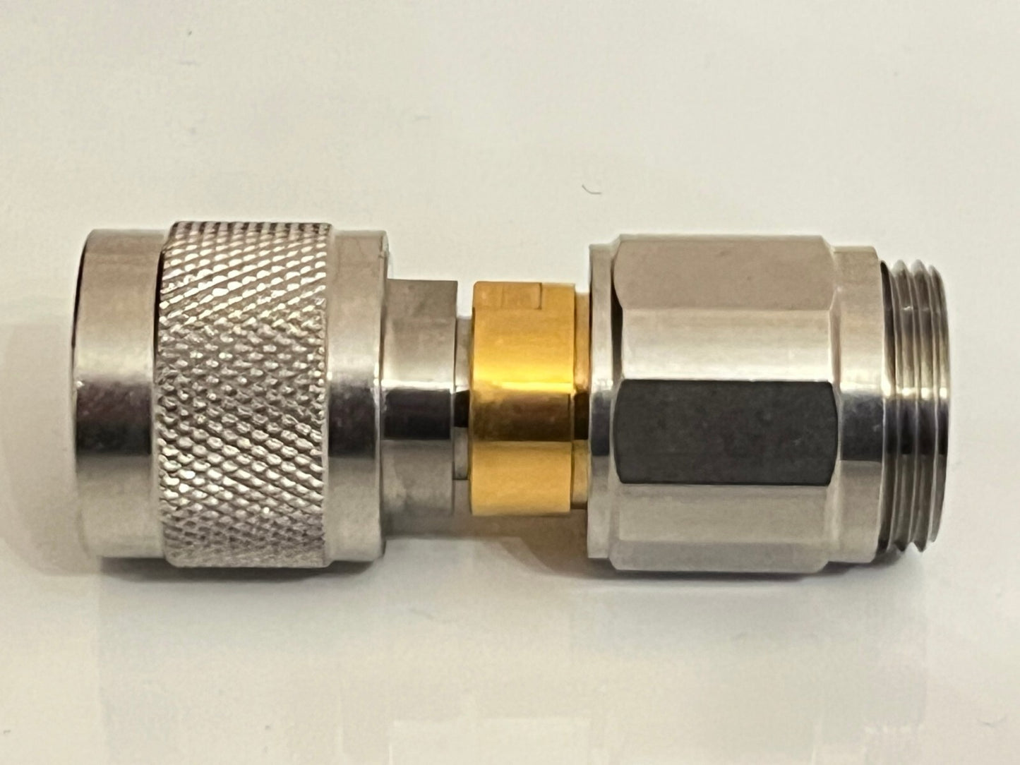 SUHNER PREMIUM APC-7 TO N TYPE MALE PRECISION RF COAXIAL ADAPTER FBA10A19