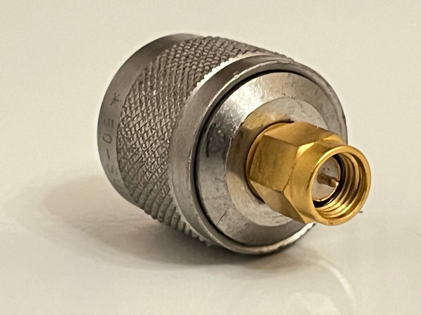 SUHNER PREMIUM N MALE TO SMA MALE PRECISION RF COAXIAL ADAPTER FBA10A98