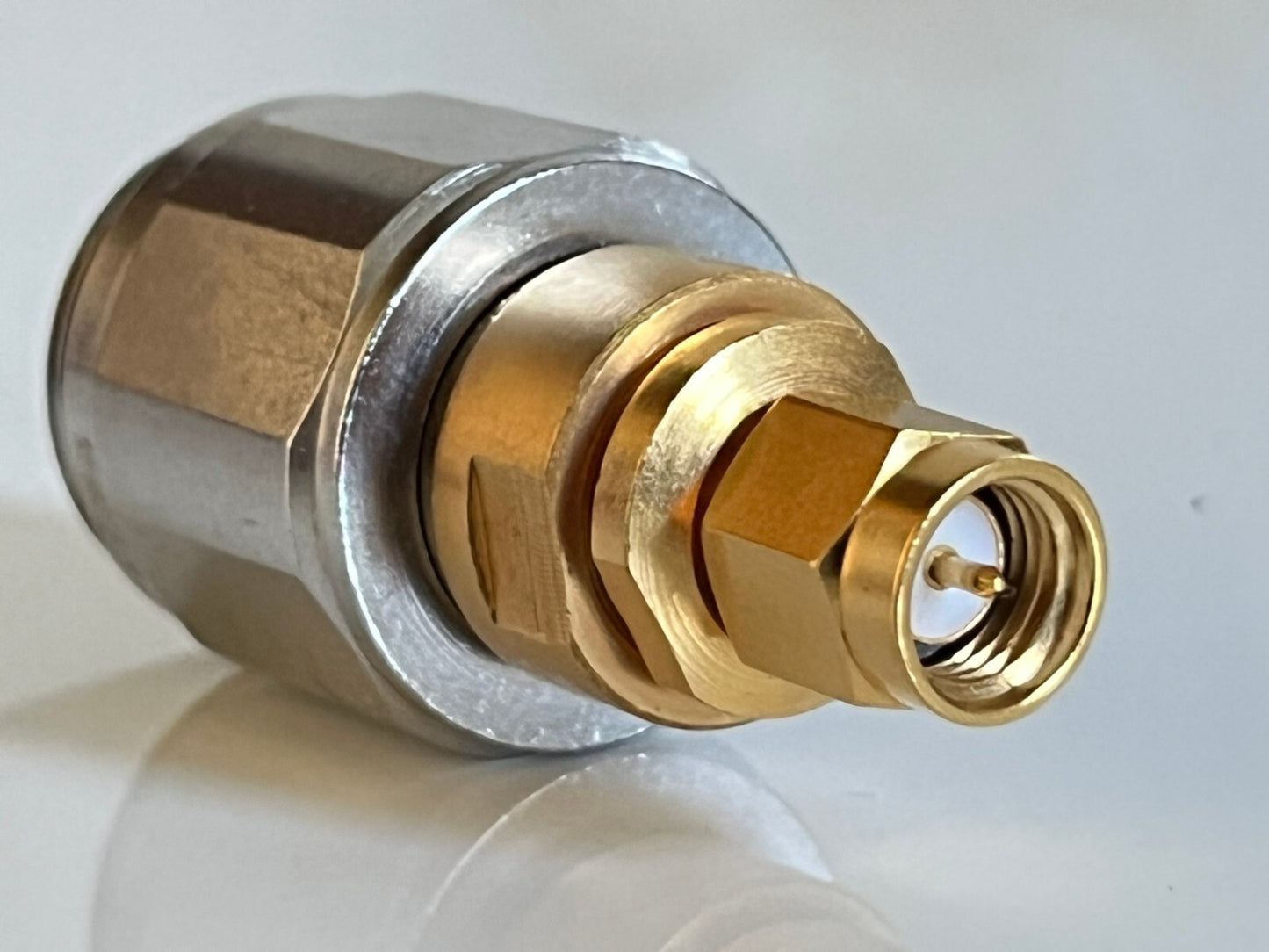 SUHNER PREMIUM APC-7 TO SMA MALE PRECISION RF COAXIAL ADAPTER FBA10A21
