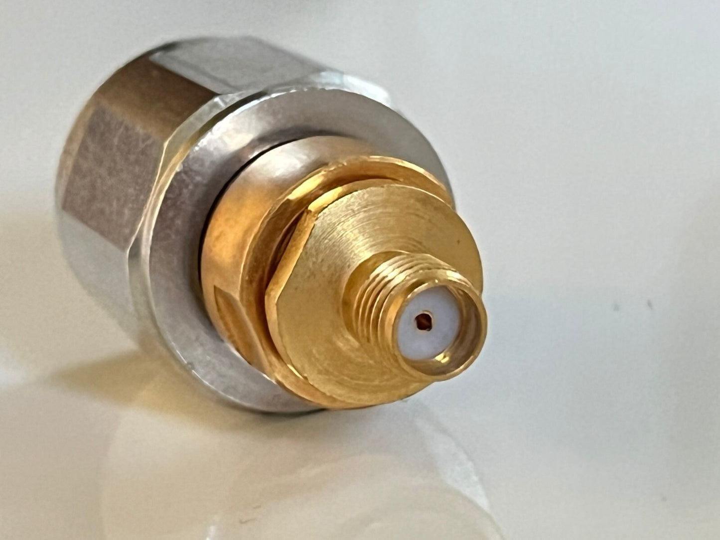 SUHNER PREMIUM APC-7 TO SMA FEMALE PRECISION RF COAXIAL ADAPTER FBA10A22