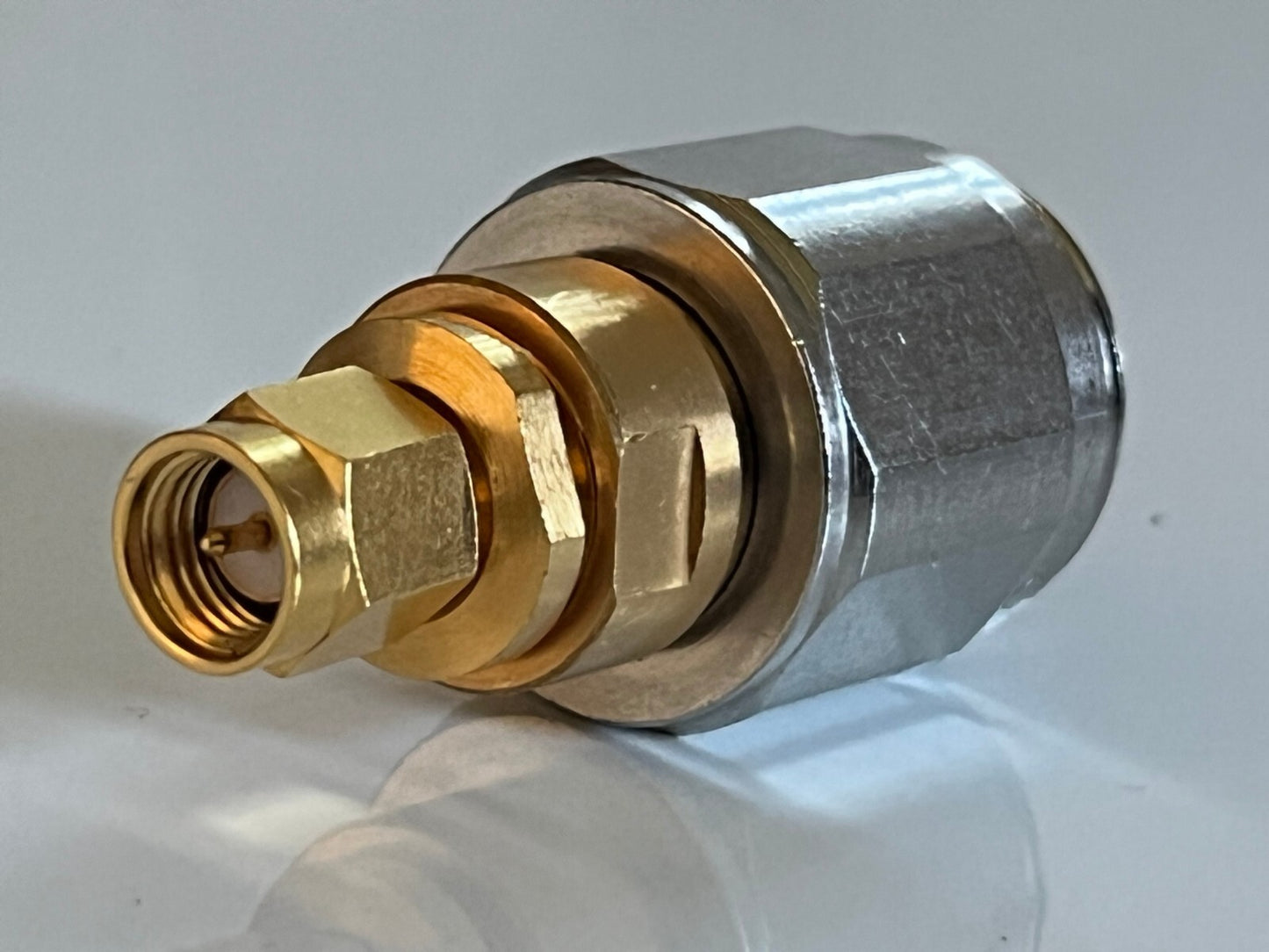 SUHNER PREMIUM APC-7 TO SMA MALE PRECISION RF COAXIAL ADAPTER FBA10A21