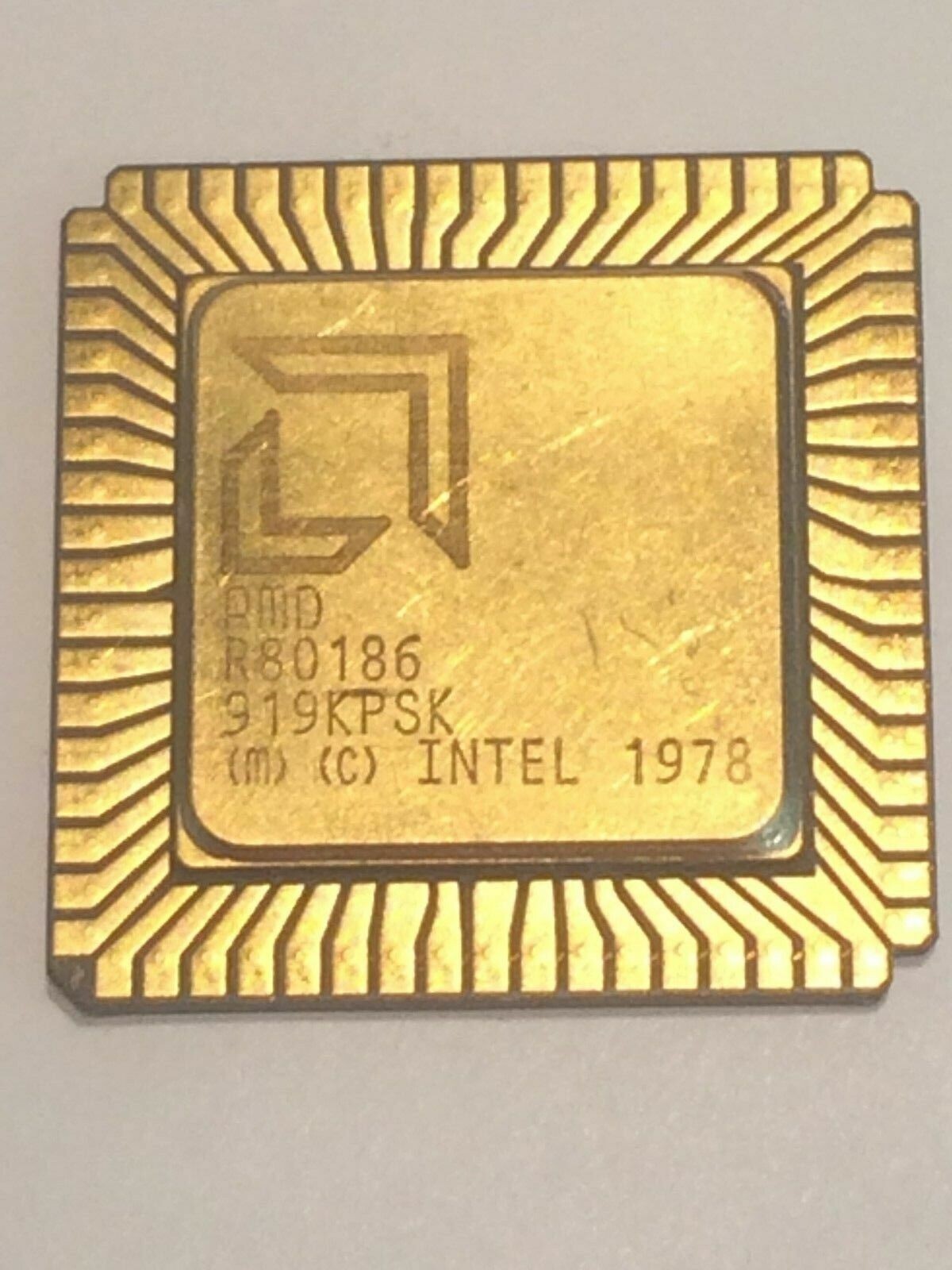 AMD R80186 FLAT PACK GOLD CERAMIC CHIP COLLECTIBLE VINTAGE PROCESSOR fba10a56